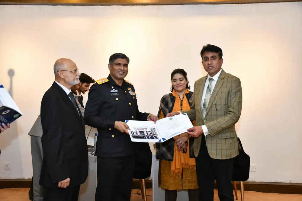 Dr. Irshad Ahmad Malik at an award presentation